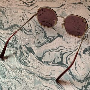 Coach sunglasses missing one small bead